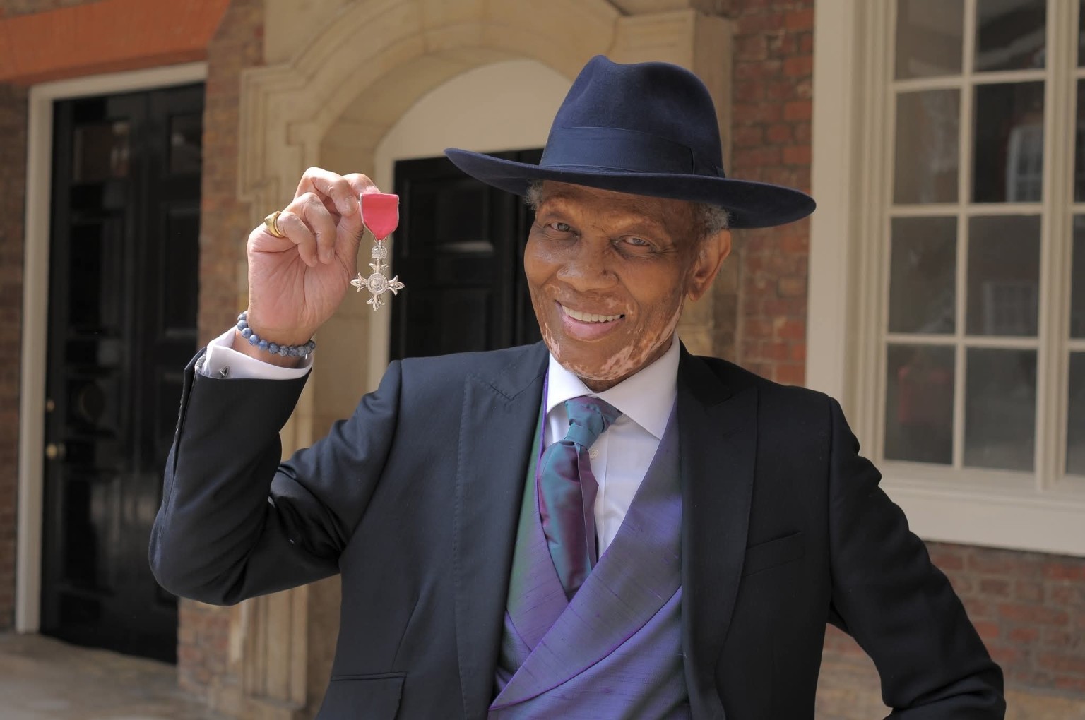 Wilfred Emmanuel-Jones with his MBE medal